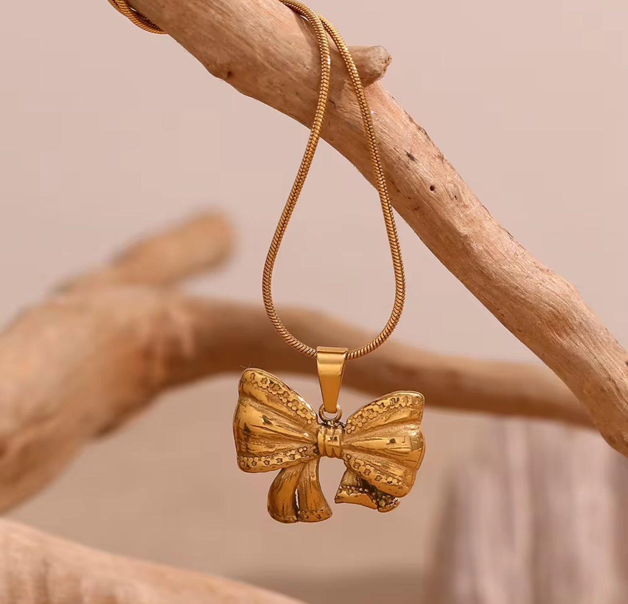 Bowtox Necklace